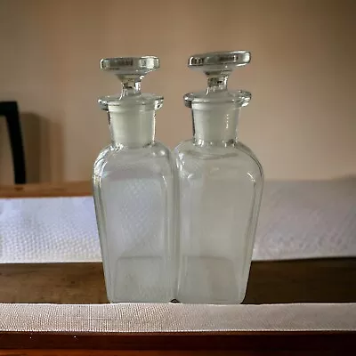 2 Vintage .5 Cup Glass Apothecary Bottles W/ Stoppers G-295 Embossed. • $1.99