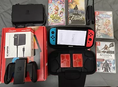 Nintendo Switch OLED HEG-001 - 64GB - Black/Neon Blue/Red Bundle! Adult Owned! • $365