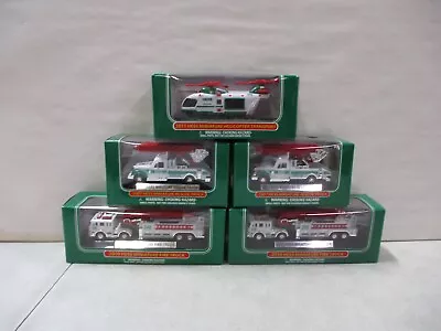 5 Hess Miniture Vehicles With Fire Truck Rescue Truck And Helicopter • $10.93