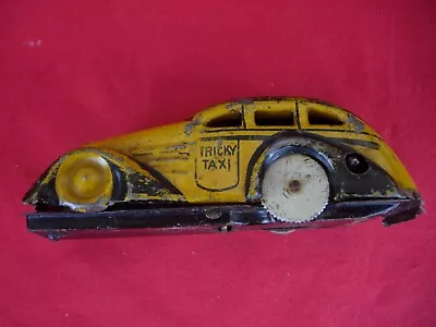 Wind Up Toy Tin MARX MAR Tricky Taxi Yellow Cab • $15.07