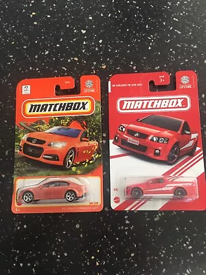 Matchbox Holden VF SSV Commodore Orange Sedan  & VE SSV Commodore Red Ute • $88.88