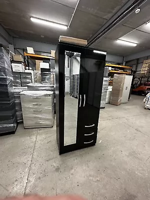 Black Wardrobe With A Half Mirrored Door And 3 Drawers • £200