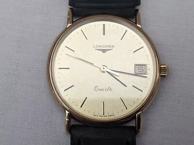 Gents 9ct Gold Longines Watch. • £300