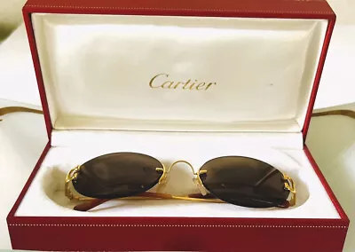$700 • Buy Cartier Scala Rimless Vintage Sunglasses France