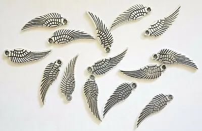 20 Small Angel Wing Charms Metal Antique Silver  - 17mm • £2.49