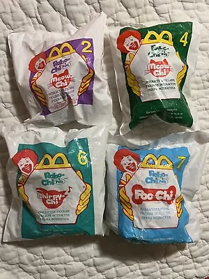 Lot Of 4 McDonalds Happy Meal Toy Robo-Chi Pets Poo-Chi Unopened Meow-chi 2000 • $12.95