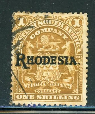 RHODESIA 92 SG107c Used 1909 1sh Coat Of Arms Ovpt  Rhodesia  CV$9 • $5.40