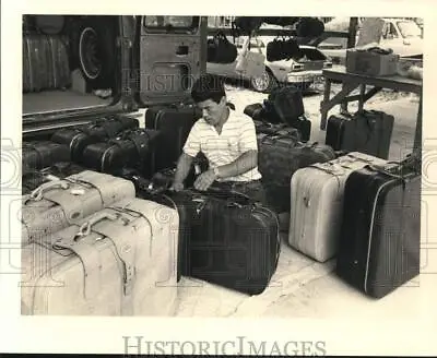 1984 Press Photo Suitcase Vendor At Flea Market Booth On Airline Road • $12.99