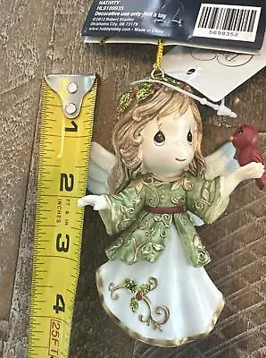 Precious Moments Angel Holding Cardinal Christmas Ornament Collectible • $19