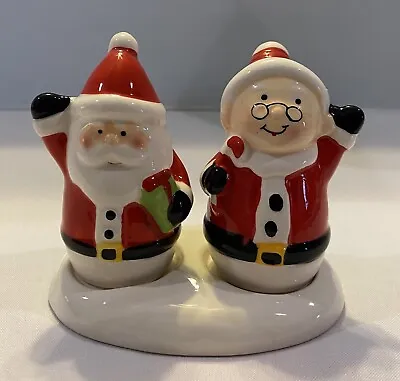 3 Piece Set - Mr. & Mrs. Santa Clause Salt And Pepper Shakers With Stand. • $10.99