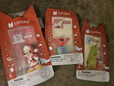 NEW TONIES Lot Of 3 ELMO CHIRSTMAS MICKEY & GRINCH Audio Characters.  • $39.99