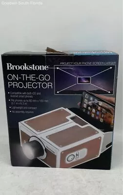 Brookstone White Brown Portable Smart Mobile Phone On-The-Go Mini Projector • $19.49