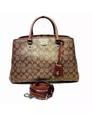 Pre Loved Coach Canvas Shoulder Handbag With Timeless Design  -  Handbags  - • $555