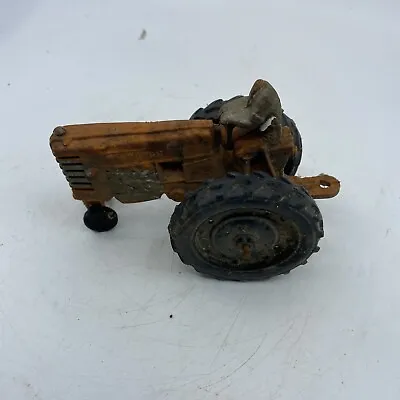Vintage Auburn Orange W/ Black Wheels Rubber Farm Tractor Toy  • $20