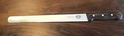 R.H. Forschner Co. 12” Victorinox Stainless Bread Knife W/ Wooden Handle. Swiss. • $41.79