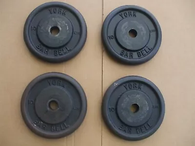 4 York 10lb. Bar Bell Plate Weights • $49