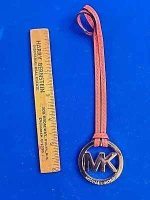 Michael Kors Gold MK Logo Charm Hang Tag Medallion Handbag  • $10