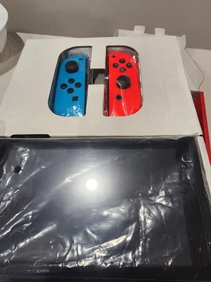 $339 • Buy Nintendo Switch Portable Gaming Console - Neon Blue/Neon Red