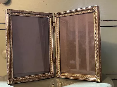 Vtg Gold Embossed Metal Bi-Fold Hinged Picture Frame 5 X7  Holds 2 Photos • $15