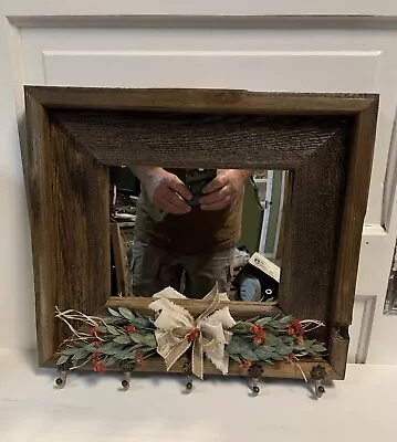 Entryway Barn Wood Mirror With Hooks Bow & Floral Arrangement.  17” X 16”. • $99