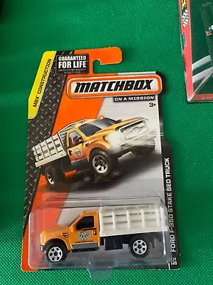 2013 Matchbox / #114 Ford F-350 Stake Bed Truck / Yellow / MBX Construction 477 • $4.99