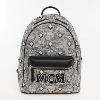MCM Denim Logo Patterned Backpack • £520
