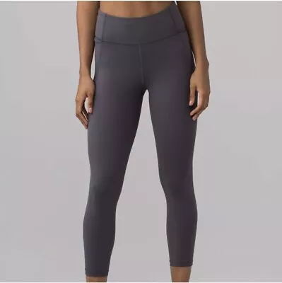 LULULEMON Leggings Final Lap Crop Nulux Dark Carbon Gray Pockets Women's 2 • £24.10