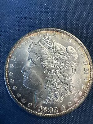 1882-CC $1 Morgan Silver Dollar • $60