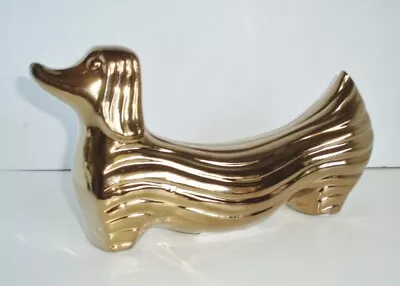 11  Modern Metallic Finish Dachshund Statue – Gold  • $26