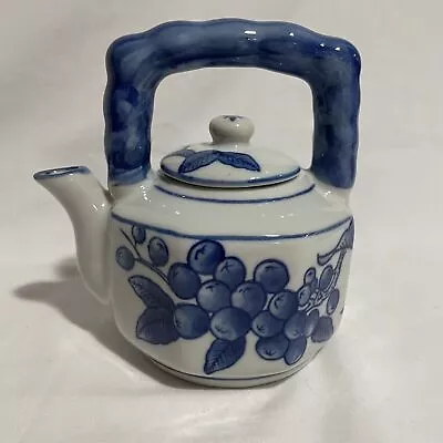 Vintage Blue And White Ceramic Round Teapot Lided • $16.50