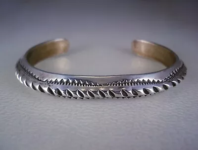 VINTAGE Randy Hoskie NAVAJO CARINATED & STAMPED STERLING SILVER BRACELET • $1