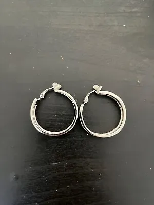 Vintage Silver Hoop Earrings • $6