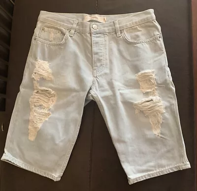 £10 • Buy Men’s Light Denim Ripped Shorts