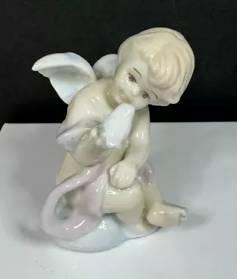 Vintage Adorable Russ Berrie Angel Holding Bird Porcelain Figurine #17106 • $12.99