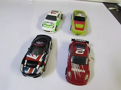 4 X Micro Scalextric Cars Only 2 X Nissan 350s 2 American Racers • £20