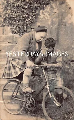 Highlander On Bicycle With Boy Aiding Fashion Kilt Tartan Postcard (42) • £36.50
