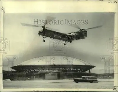 1958 Press Photo USAF Helicopter Flies Past  Flying Saucer  Las Vegas Building • $19.99