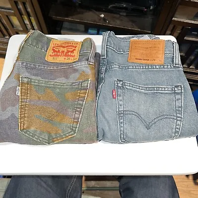 2 Pairs Of Pants Levi Corduroy Camo/ Faded Denim • $30