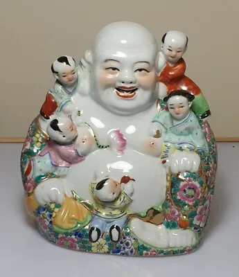 A Fine Quality Famille Rose Porcelain Laughing Buddha With Children. Signed.  • £175