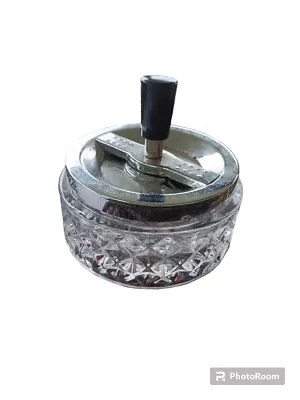 4.75  Vintage Push Down Glass Spinning Ashtray  • $10