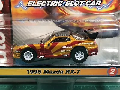 Auto World XTraction Import Heat '95 Mazda RX-7 Rising Sun HO Slot Car MIP • $27.50