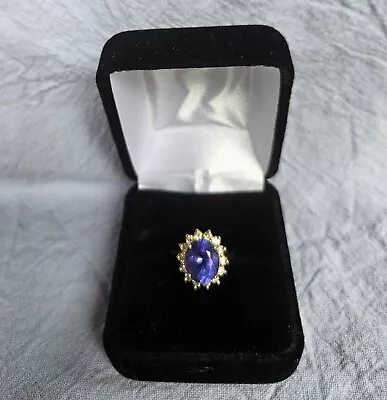 14K YG  4.24ct Tanzanite Center Stone With .68 Cttw Diamonds (F-G VS2-SI 1)... • $799