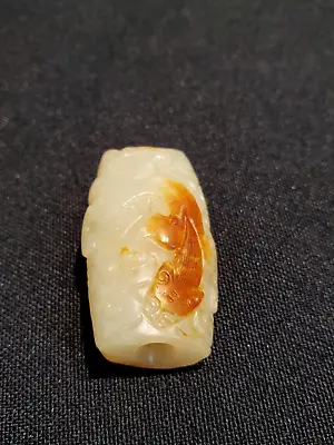 Ming，A Delicated Hand-carved ”Chi-Long“ Celadon Jade Pendant/ 明，螭龙纹红沁白玉勒子 • $3000