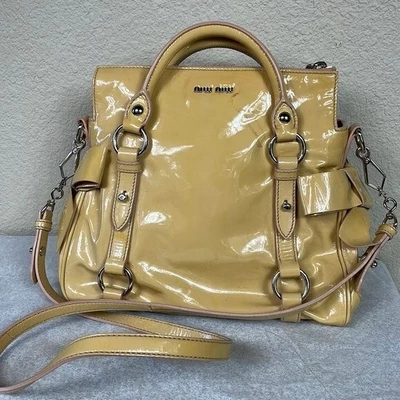 $140 • Buy Miu Miu Vitello Lux Side Bow Hand Bag In Beige Patent Leather