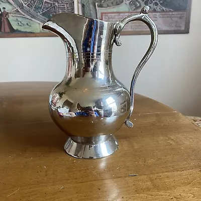 Polished Metal Water Pitcher  • $25