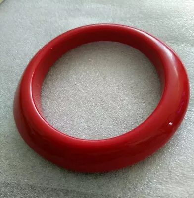 VINTAGE RED BAKELITE BANGLE. 16cm. • $85