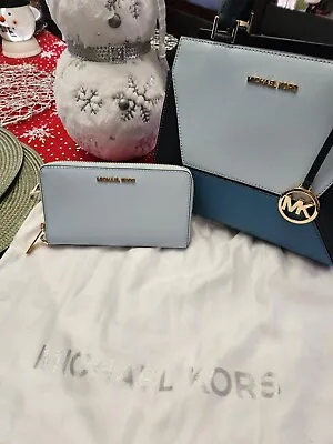 Michael Kors NEW Blue Wallet Never Used. • $100