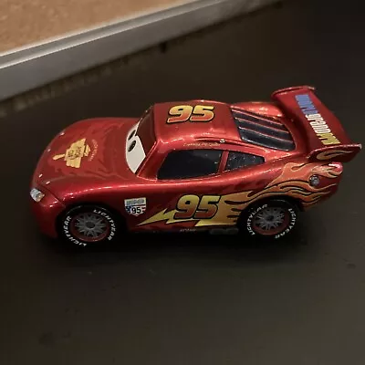 Disney Pixar Cars 2 Lightning McQueen With Racing Wheels 12 • $5.99