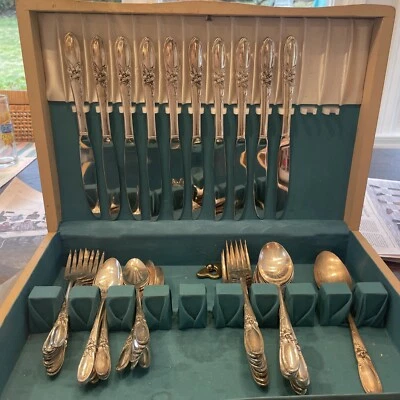 $150 • Buy Community Silverware White Orchid Pattern