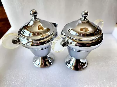 Vintage Chrome Metal Creamer & Sugar Bowl Both With Lids & Translucent Handles. • $25